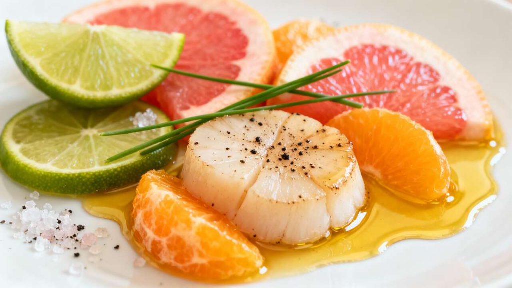 Carpaccio de Saint-Jacques aux agrumes, un zeste d'élégance